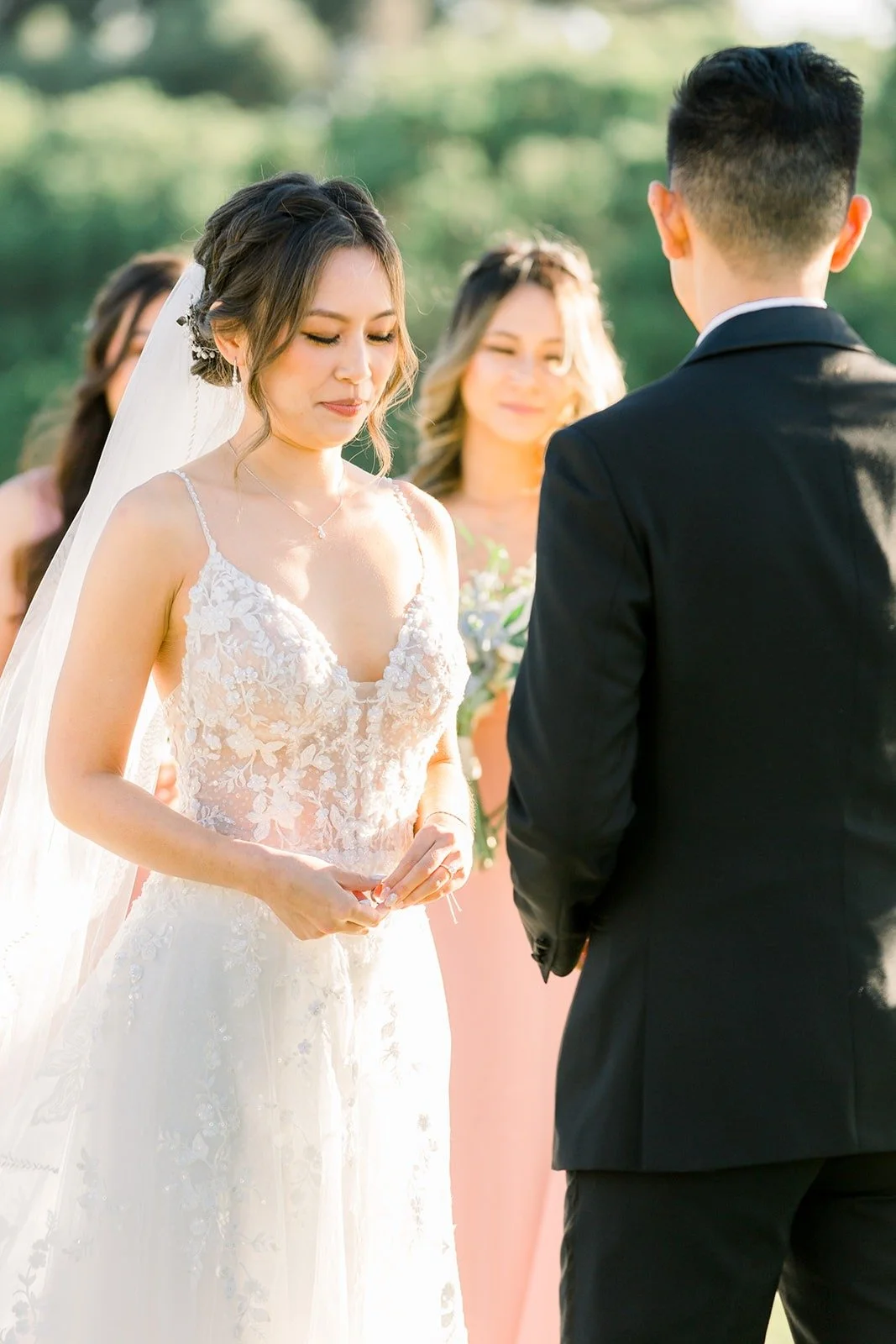 Josephine and David holding hands during the ceremony