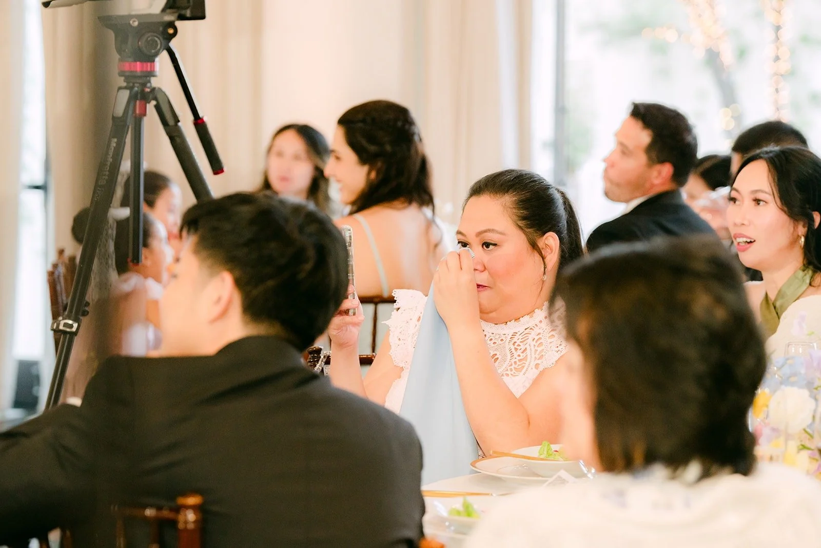 Guests reacting from their tables during the speeches