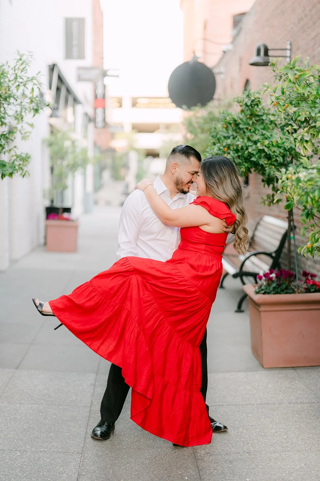 Ankush dips Linh in the middle of the paseo.
