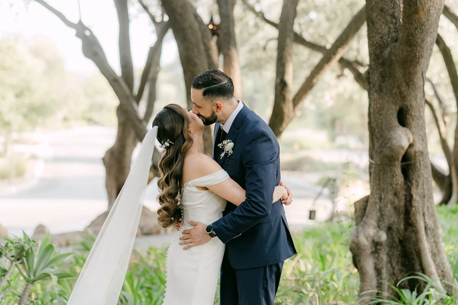 Danny kissing Mariana in the olive grove, photographed by One and Only Production