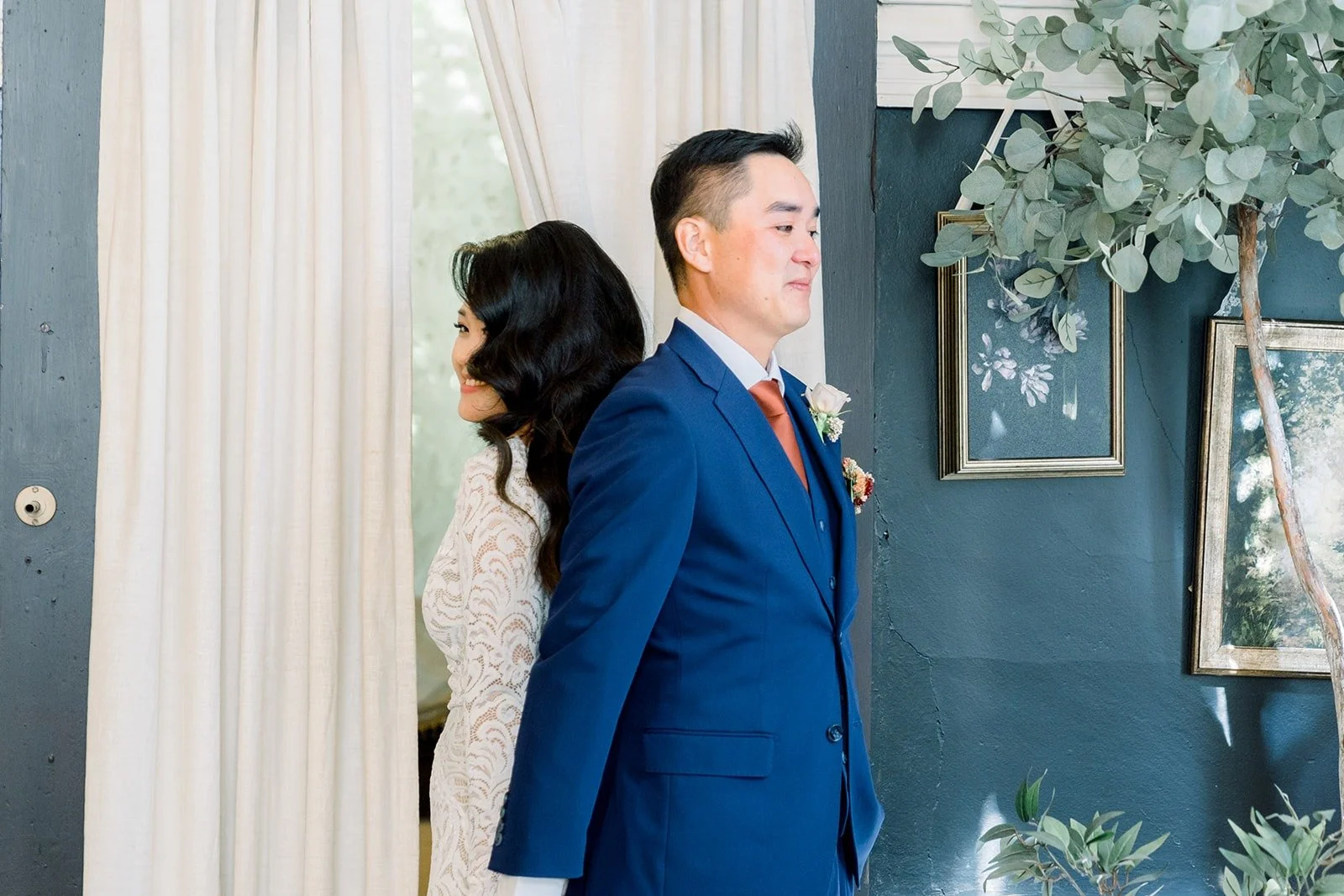 Hannah and Vincent's first touch, back to back at the door