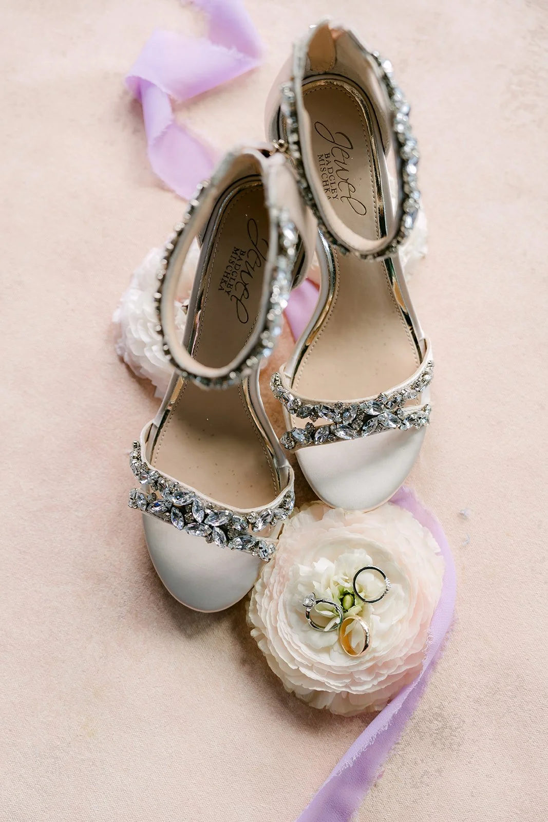 Vannie's sparkly bridal heels tied with lilac ribbon.