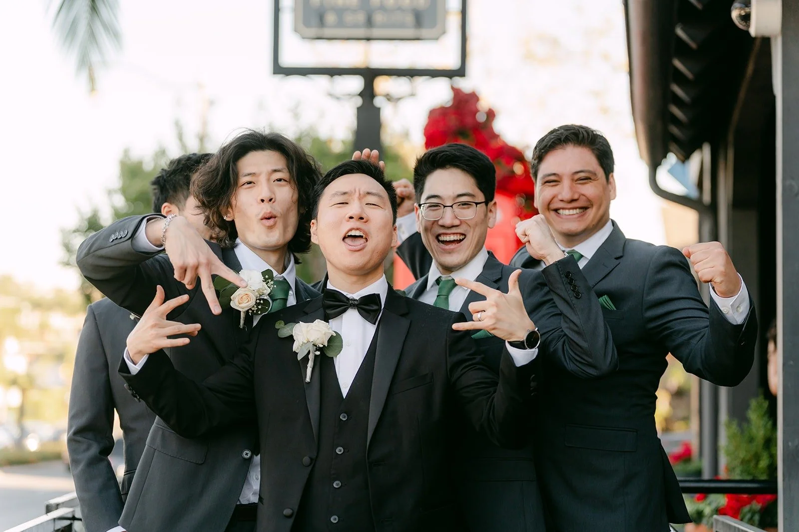Jason's groomsmen hamming it up outside the restaurant