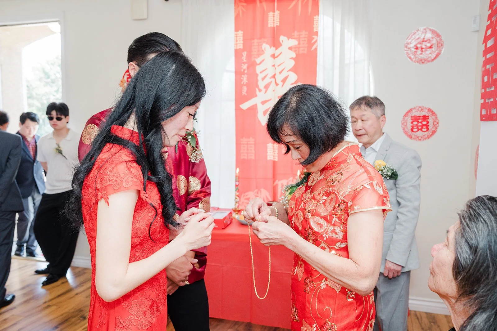 Valerie receiving a gift from a relative.