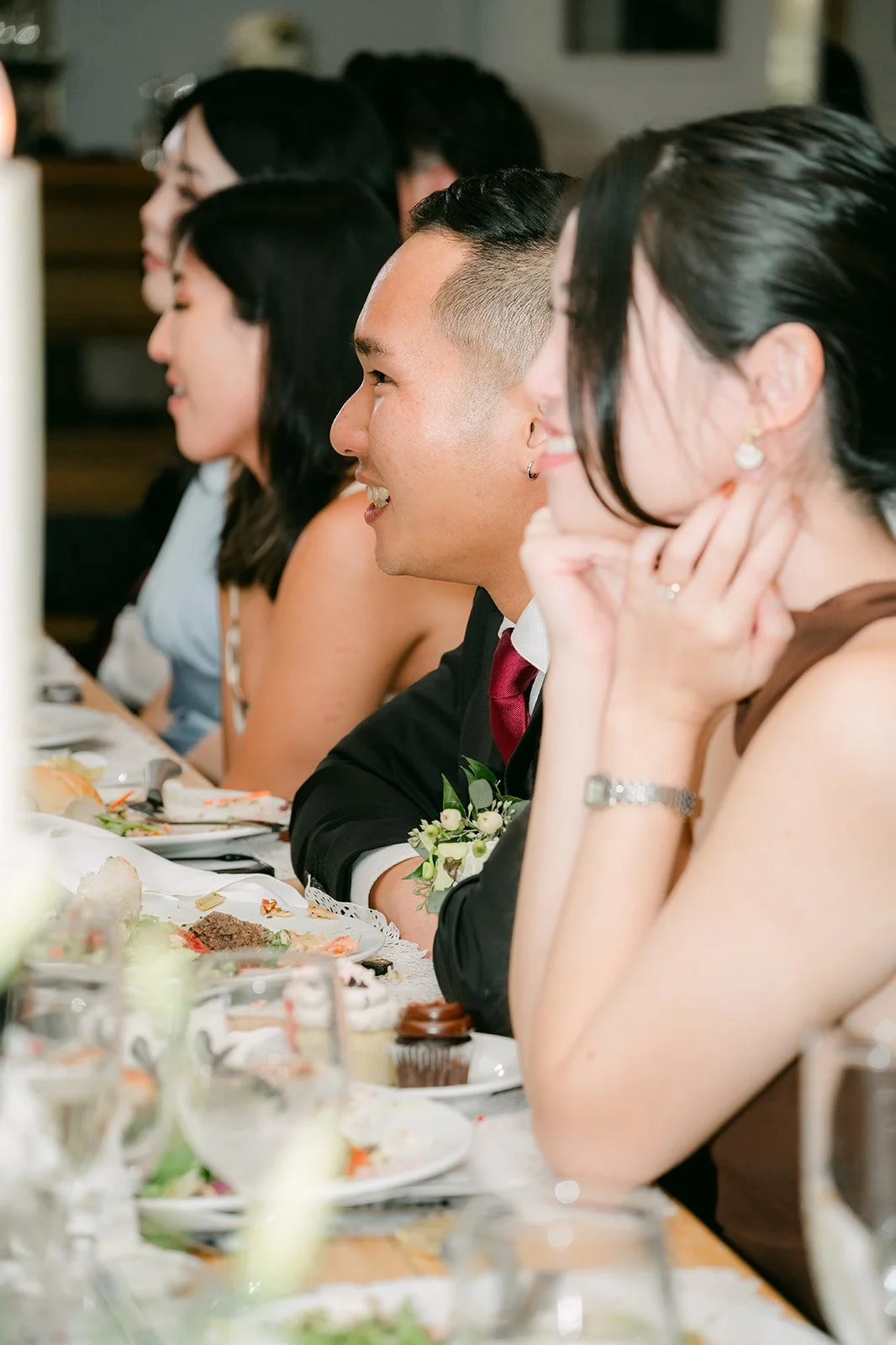 Guests raising glasses during a toast