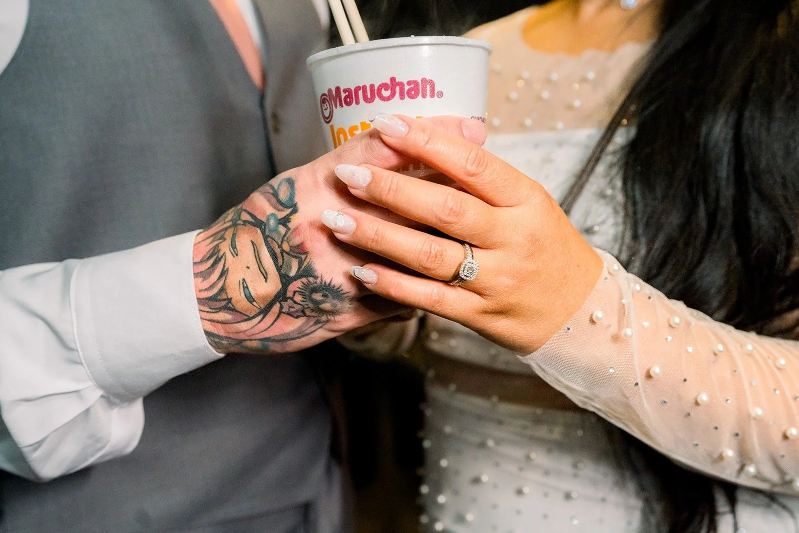 Betsy and Mikey share a ramen cup, photographed by One and Only Production