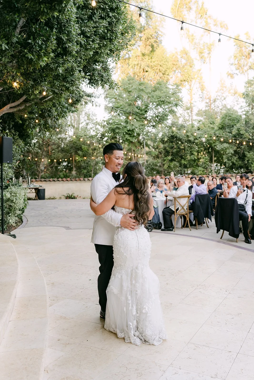 Caryl spinning Nicole during their first dance.