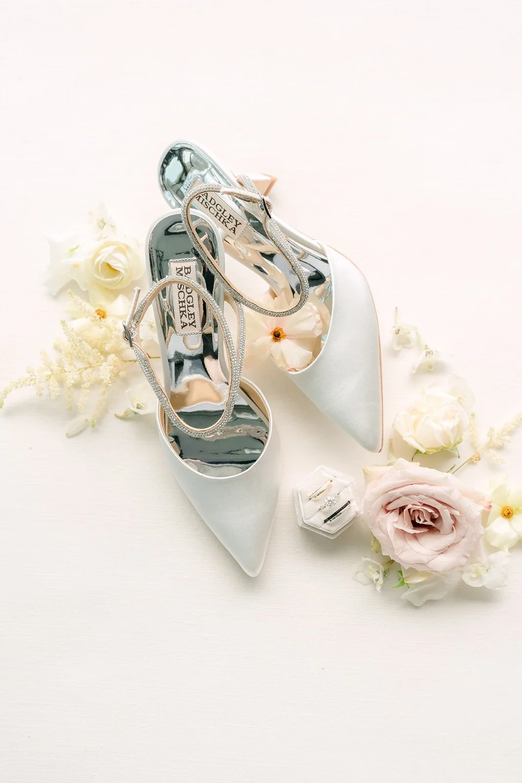 Angela's silver heels with ivory and blush flowers