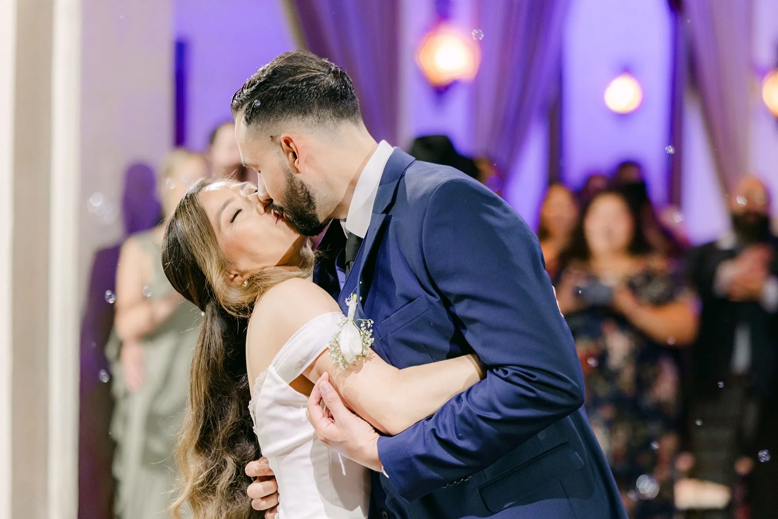 Danny kissing Mariana during their first dance