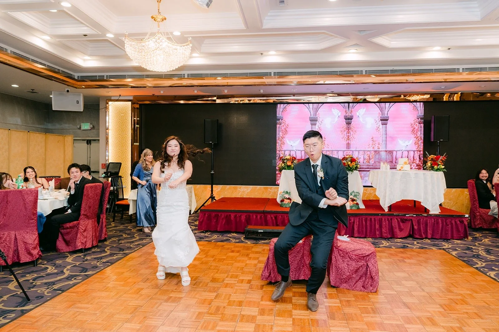 Shayna and Robert play a game in the middle of the dance floor