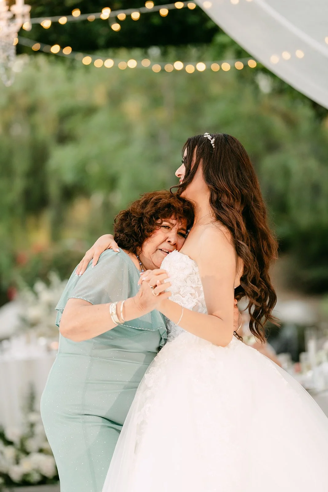 Sandra hugging her grandmother during their dance.