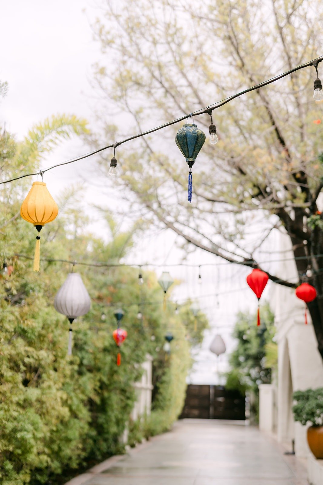 String lights and lanterns over the courtyard at The Villa