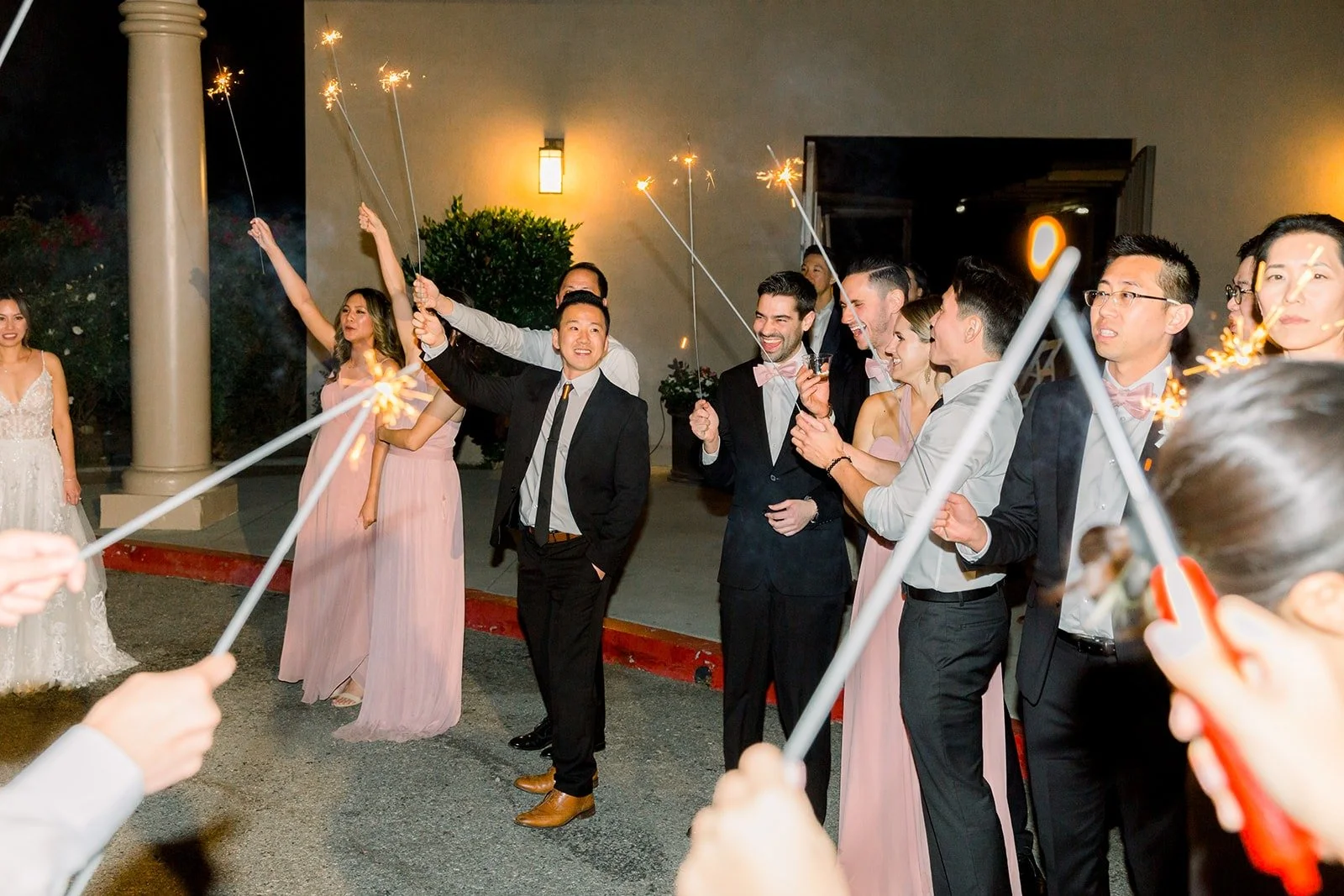 Guests lining up with sparklers for the exit