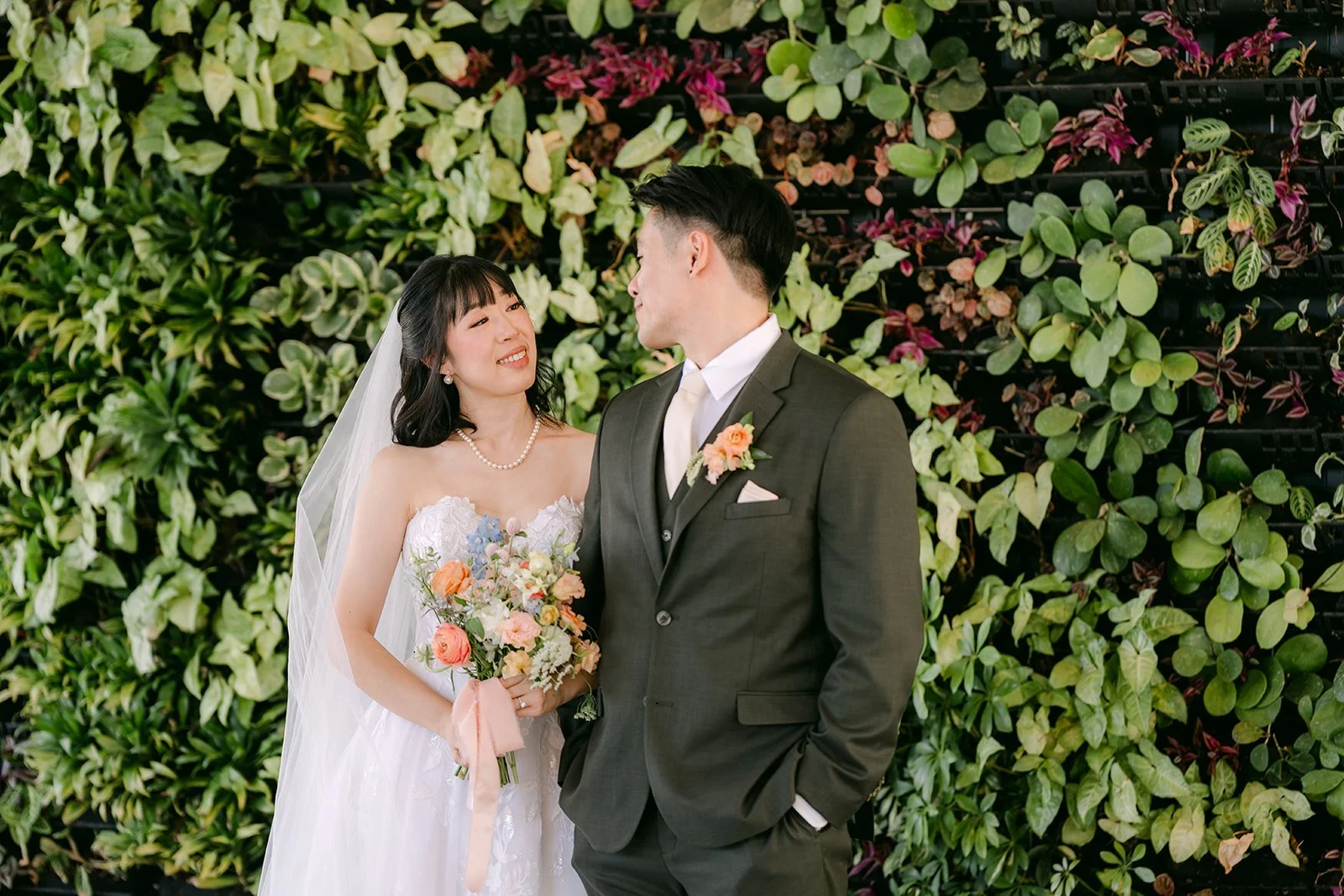 Couple smiling together after their first look