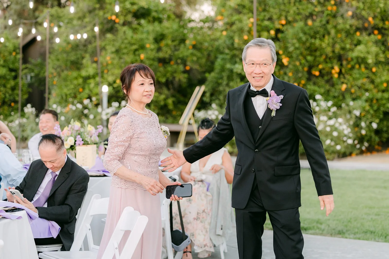 Guests laughing during the reception.