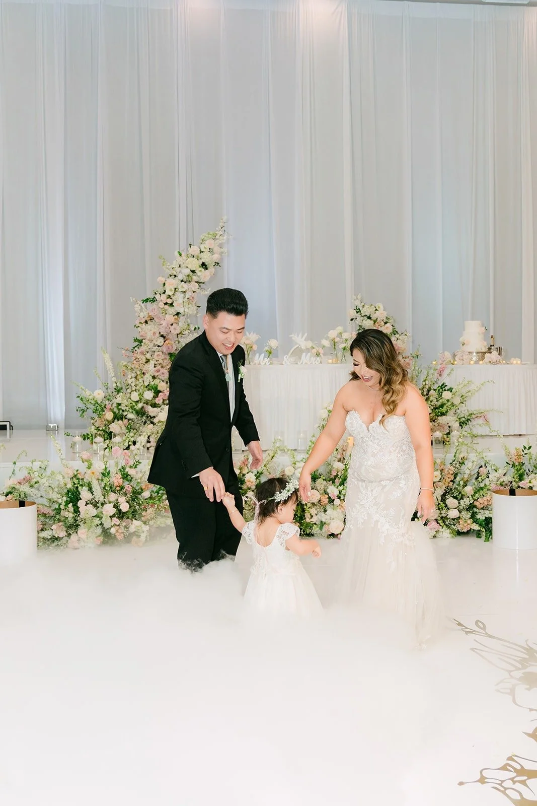 Their little girl joining Candice and Vincent on the dance floor