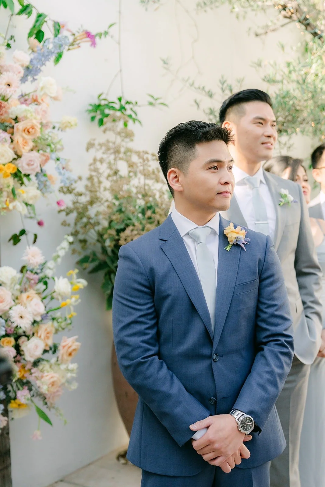 Jerrick waiting at the altar as the processional begins