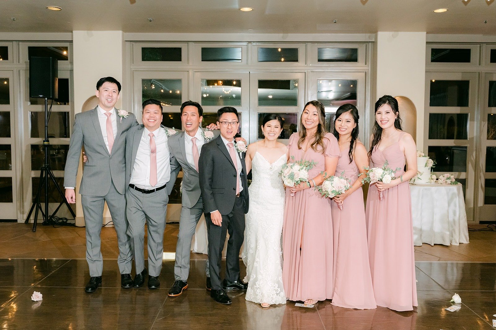 The wedding party lined up behind Xuemin and Alex