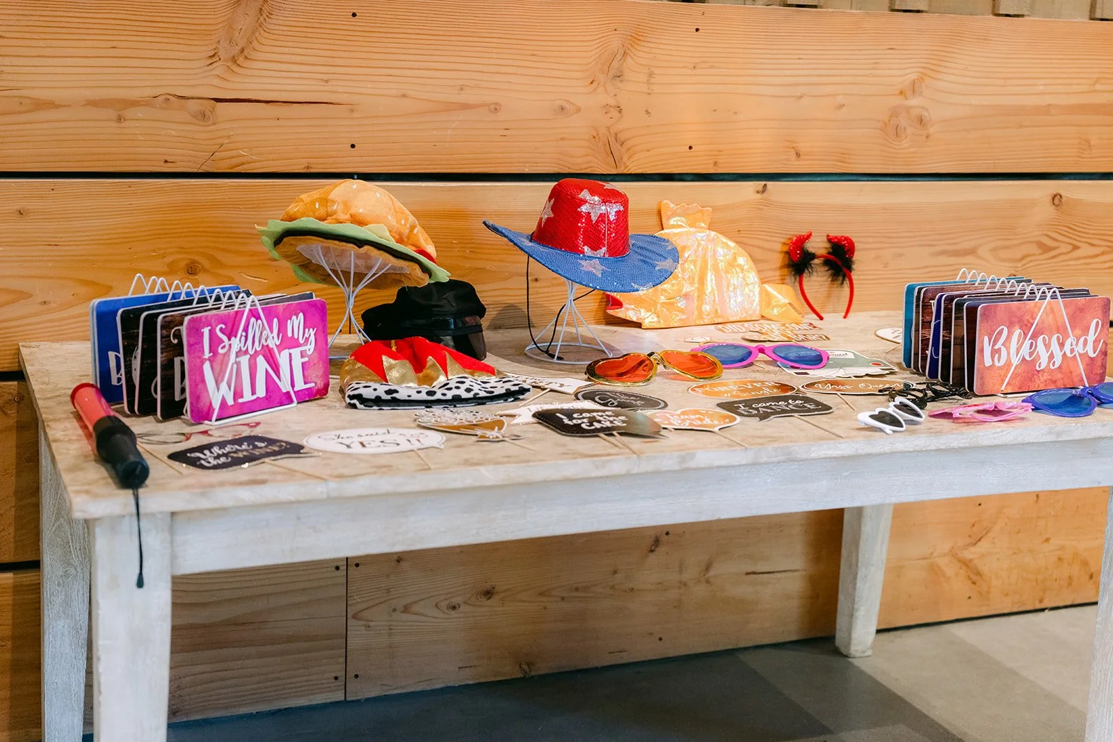 Photo booth props table at the reception
