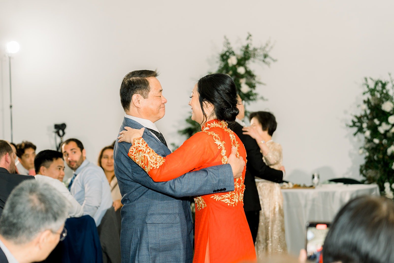 Cindy dances with a family member