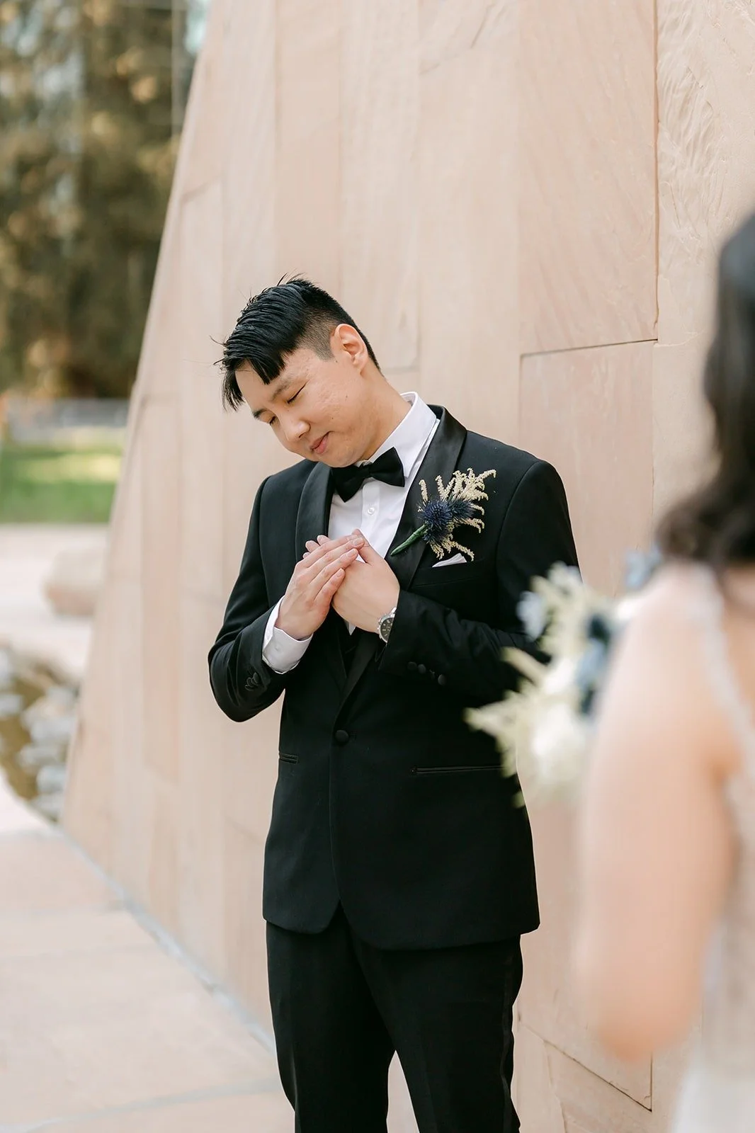 James adjusting his boutonniere, photographed by One and Only Production