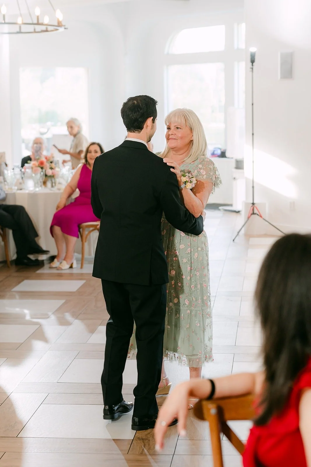 Kevin dancing with his mom