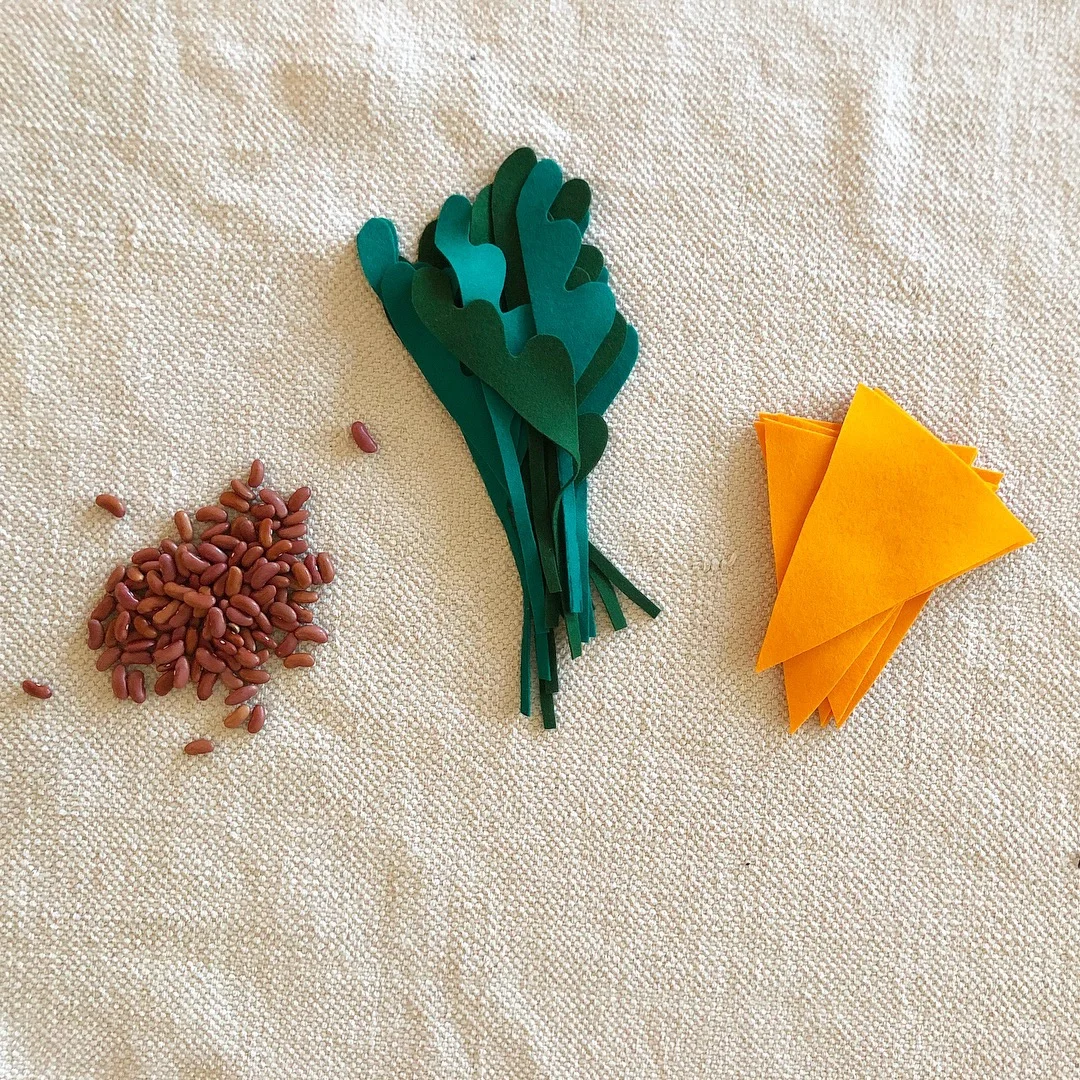  The makings of little sewn carrots.  
