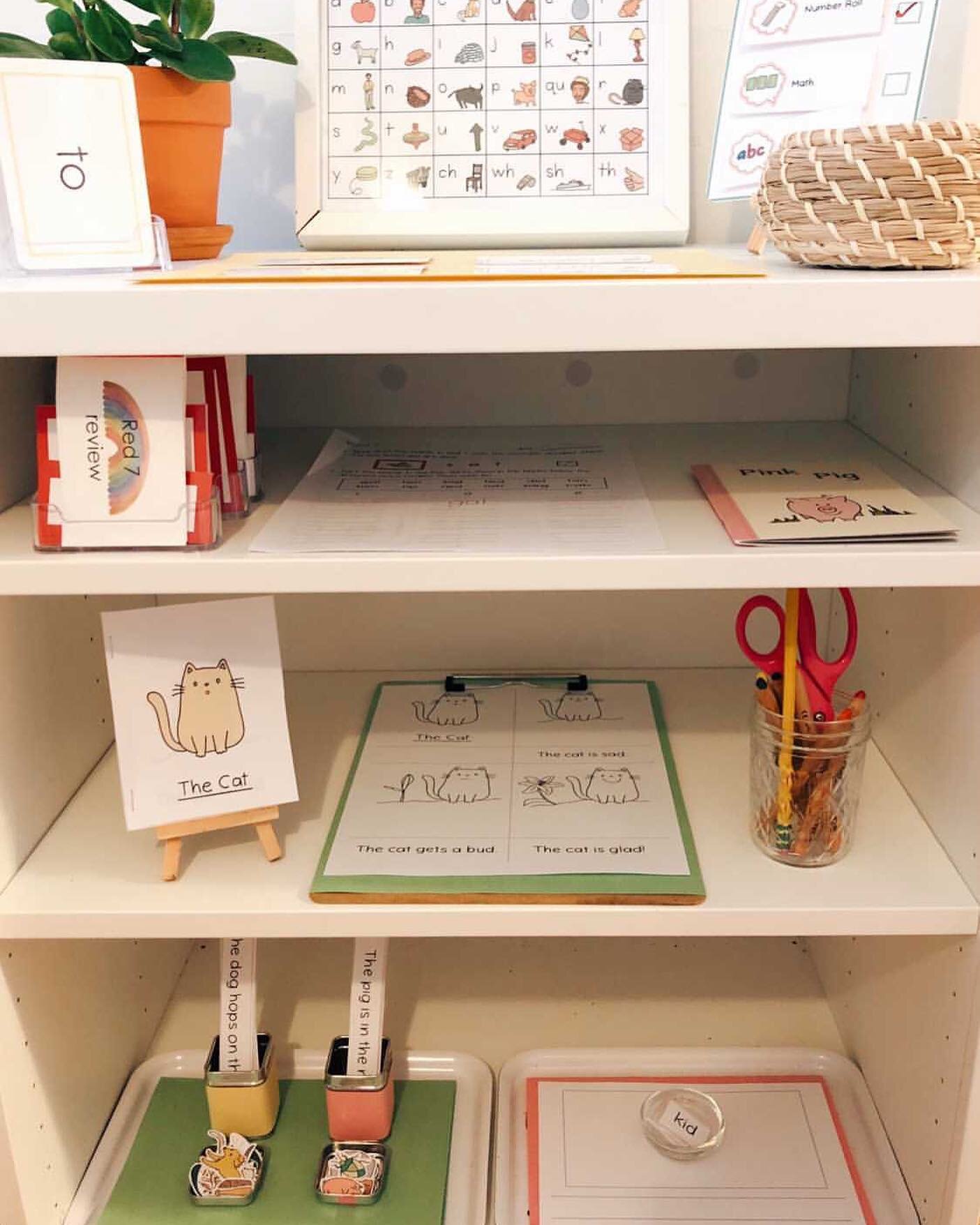Look at this beautiful and simple shelf from Rachel at @homeschool.for.now. She is stocked with Missy Montessori goodies! ⁣
⁣
From left to right, top to bottom:⁣
⁣
Top Shelf: Trick Word Cards (find this as a single under Language), ABC Chart (find th