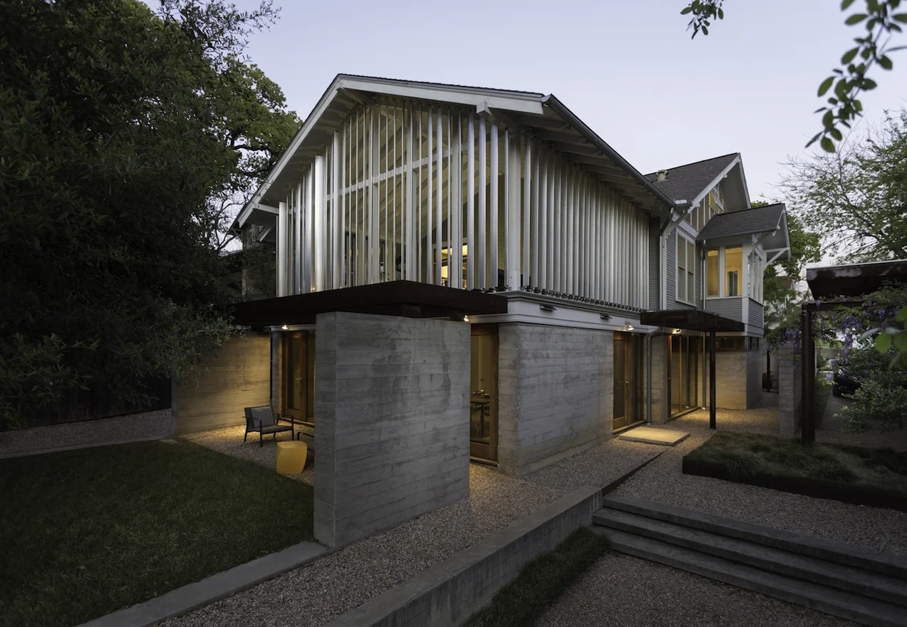 The 1,100sf structure was expanded to 3,100sf to create a home, work studio and rental apartment.