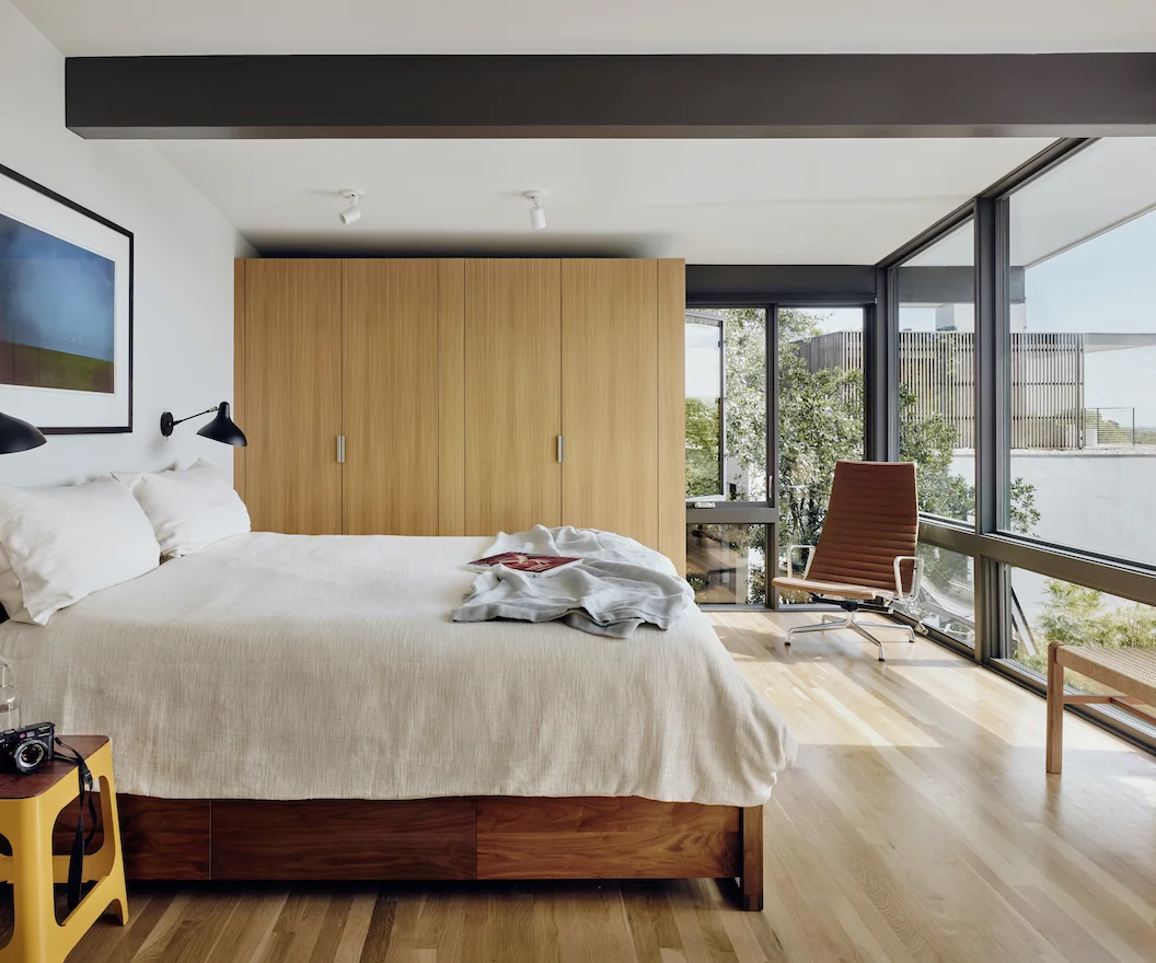 For the private side of the house, a new more generous master bedroom and bath was created by repositioning bedroom closets.