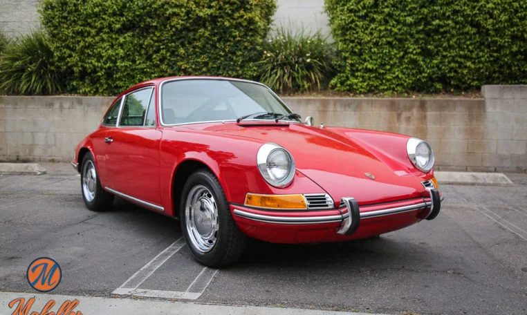 1969-porsche-911t-red-makellos-classics-passenger-side-view.jpeg