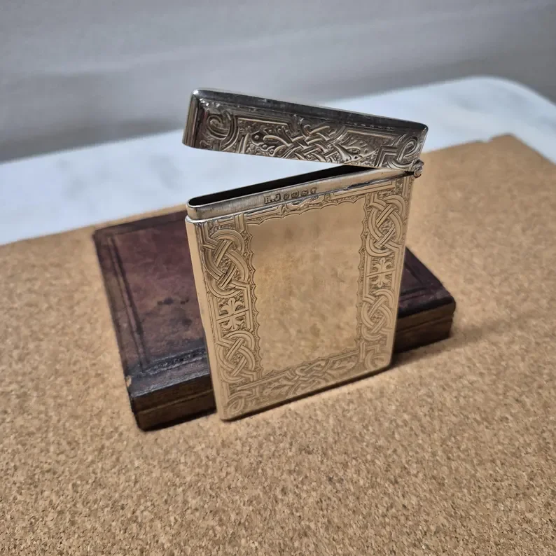 il_794xN.7486039952_7pe9  silver card case no1.webp