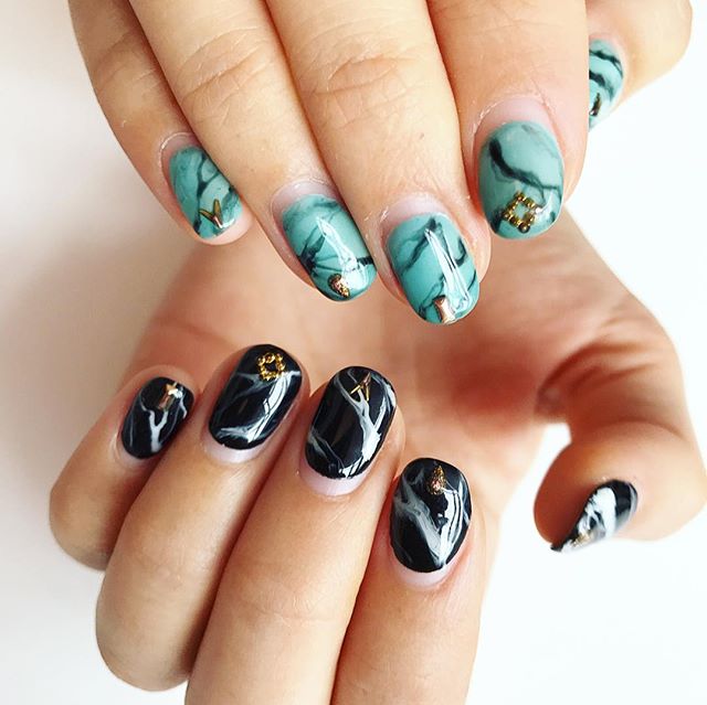 Two color marble 💠🖤 Also a classic example of what happens when you take too long to take photos of your nails lmao 😪😭
.
Check out the blog post on this look &amp; our review of @enjoynailarts in Flushing, NY at the link in bio!
.
.
.
#thenailcon