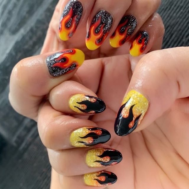 Some #firenails to go along with our previous post...🔥❄️ Who's ready for the last episode of #GOT tonight?!? 🐉⚔️🏰🛡
.
PC: @nailsbymei
.
.
.
#thenailconnoisseur #nail #nails #nailart #nailswag #nailstagram #nailsofinstagram #naildesign #nailaddict 