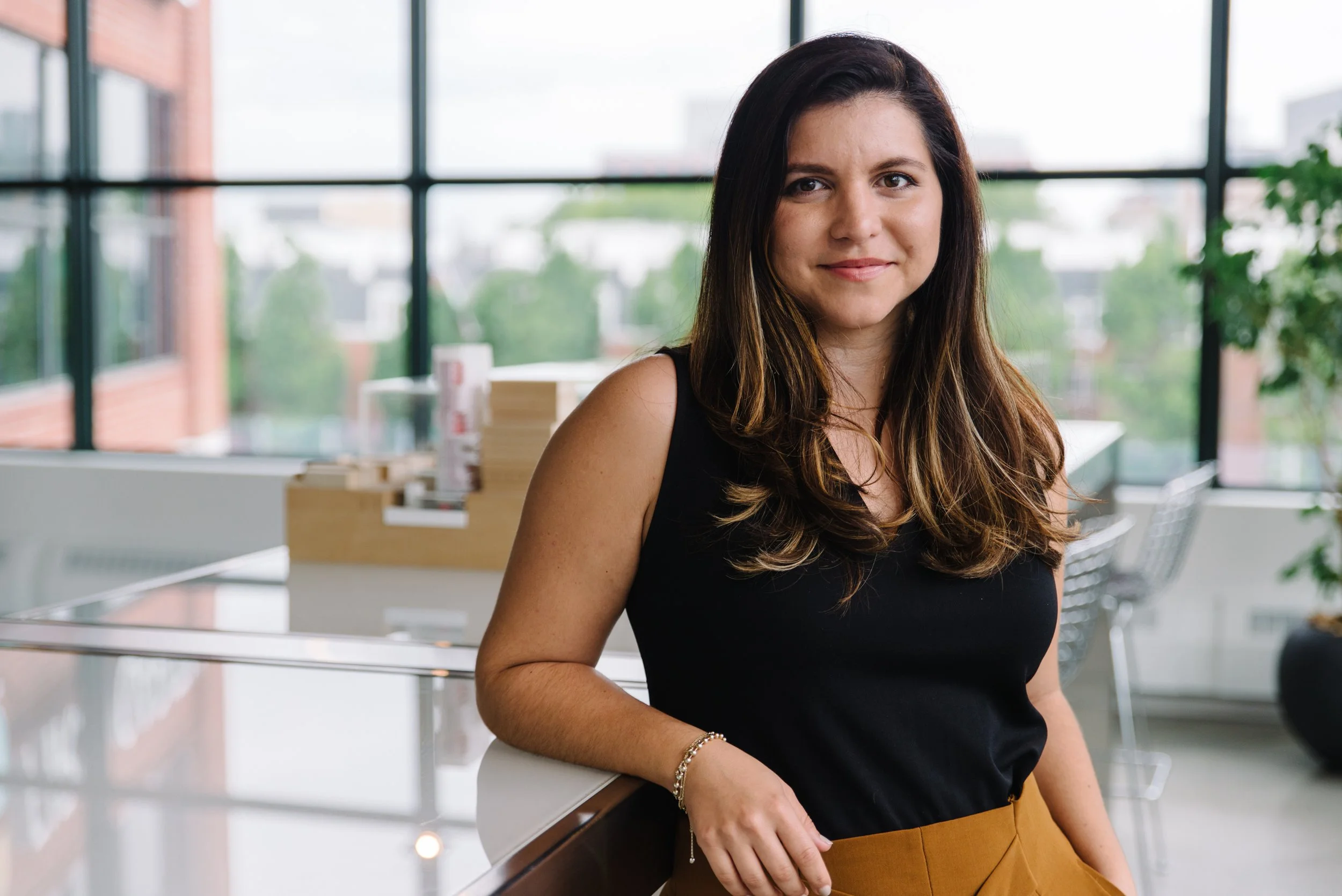 Corporate headshot of a Kasian team member photographed in the Toronto office