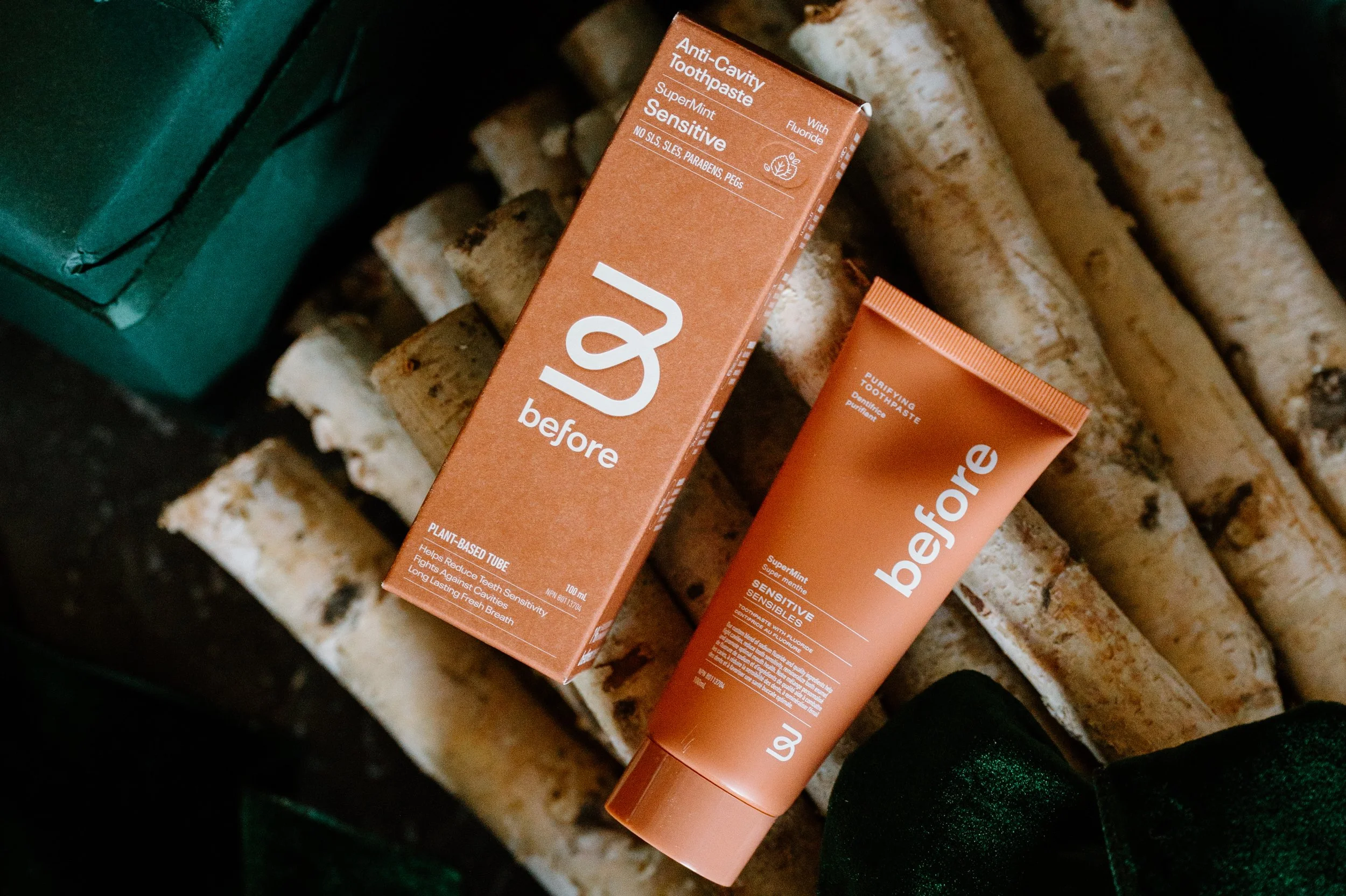 Sustainable oral care products styled with festive decorations