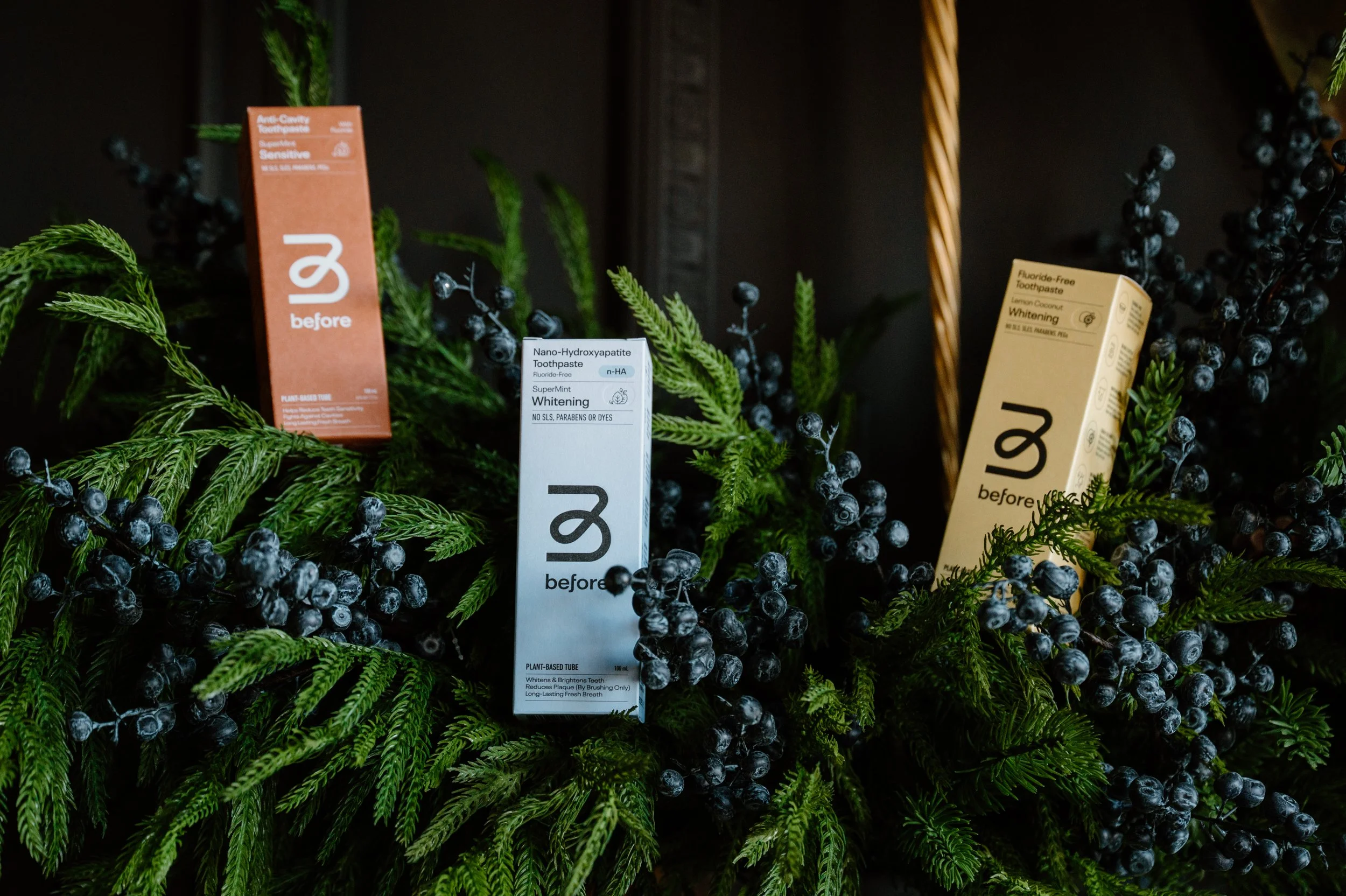 Eco-friendly toothpaste displayed with wreath for seasonal marketing