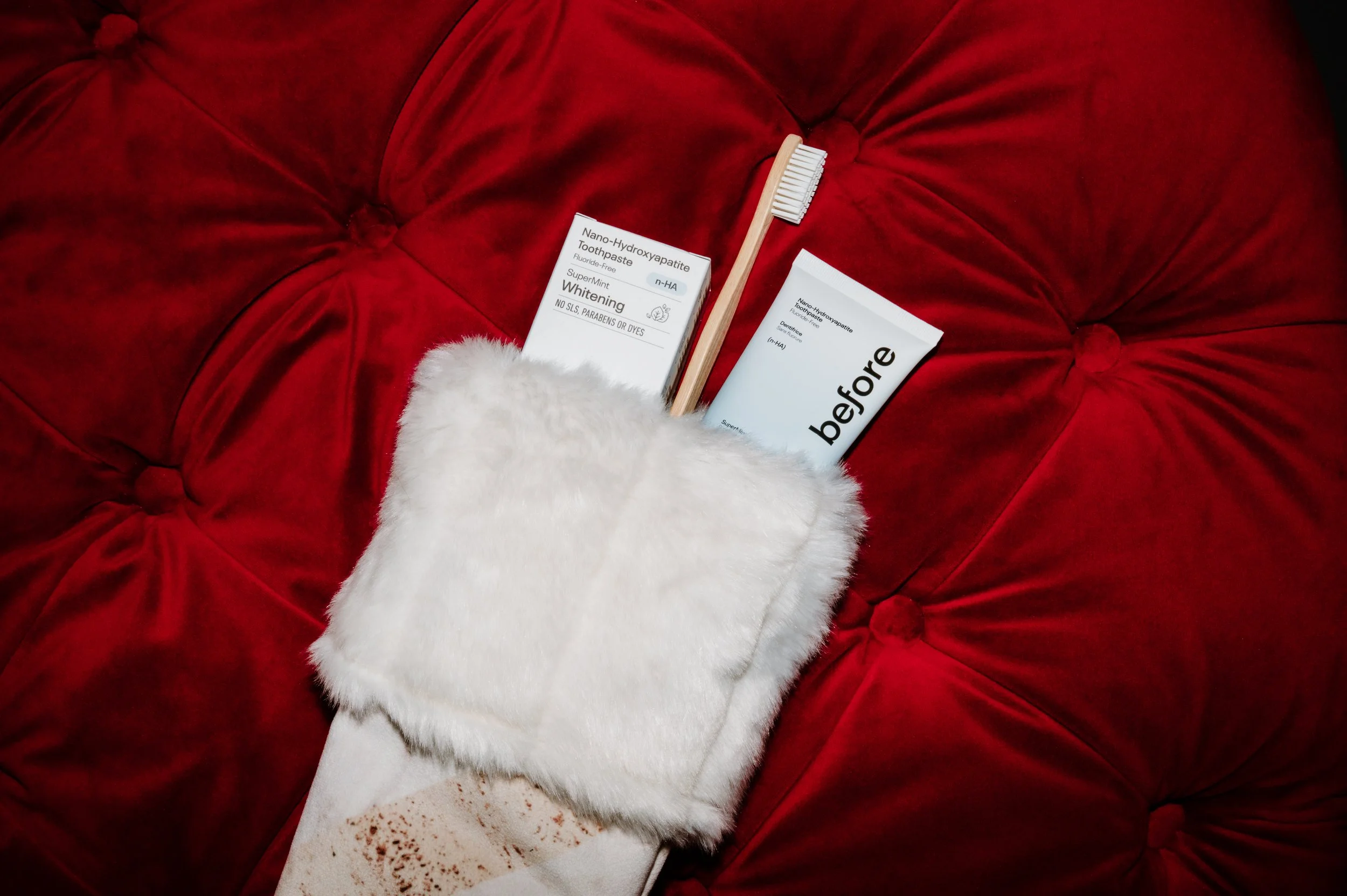 Toothpaste and toothbrushes displayed as a holiday stocking stuffer