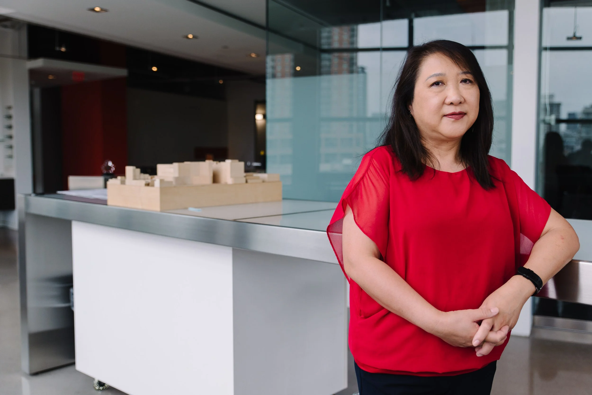 Corporate portrait of a Kasian team member photographed in natural light at the office