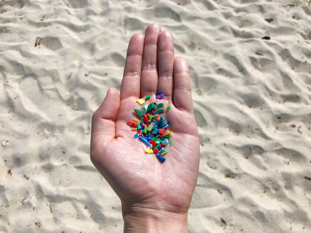 hubbub_plastics_micro_hand_beach.jpg
