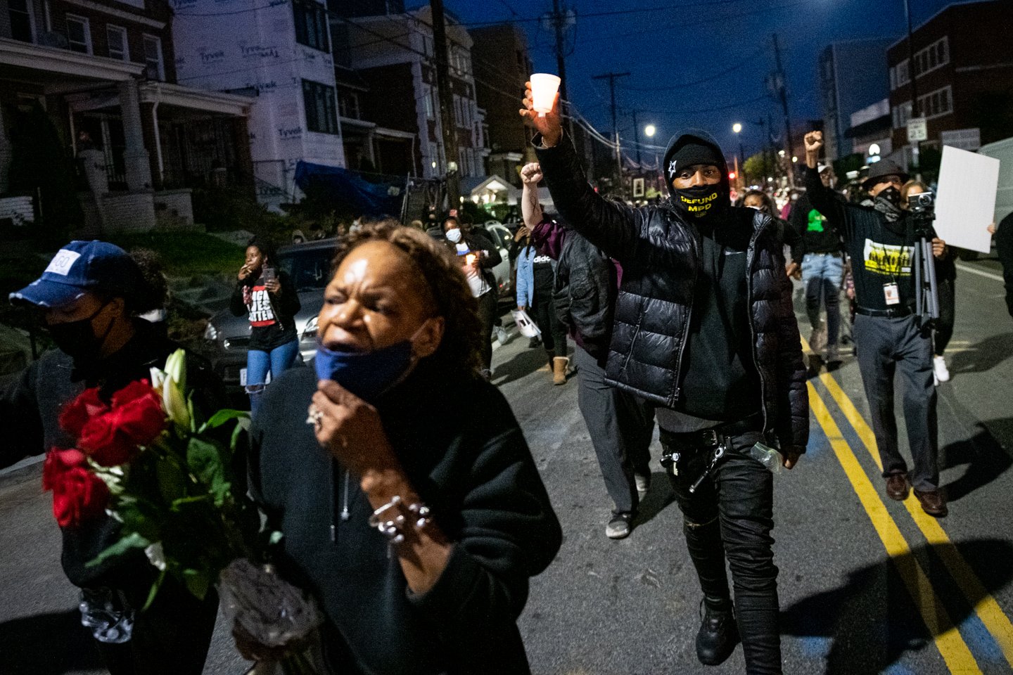  Karen Hylton-Brown, front-left, leads a protest march demanding justice for her son Karon Hylton-Brown, near where he was struck by a vehicle during an unauthorized police chase, in Washington, D.C., on October 28, 2020. (Photo by Graeme Sloan) 