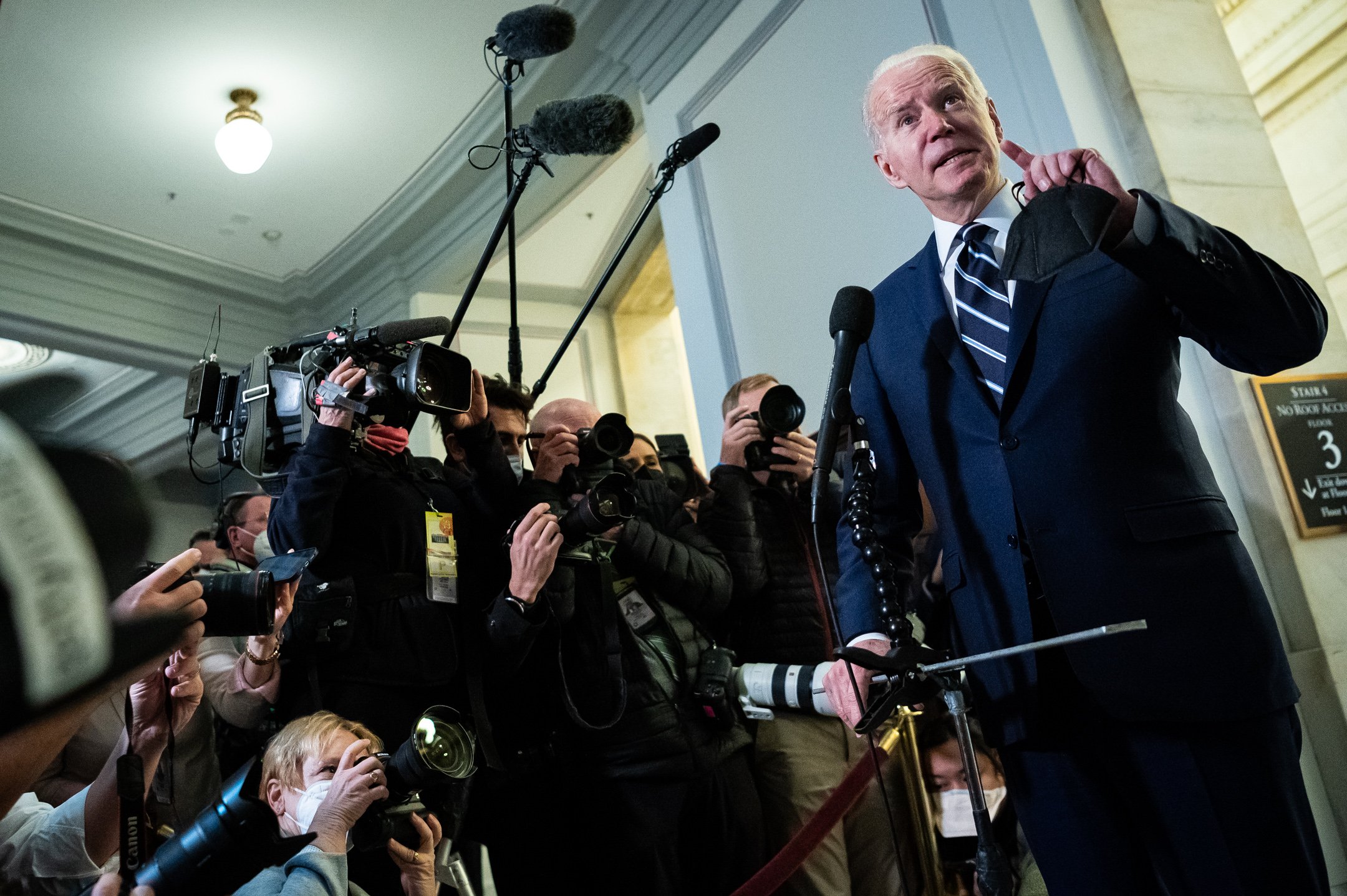  President Joe Biden speaks to media after leaving a luncheon with Senate Democrats where they discussed voting rights and filibuster reform, at the U.S. Capitol, in Washington, D.C., on January 13, 2022. (Graeme Sloan for Sipa USA) 