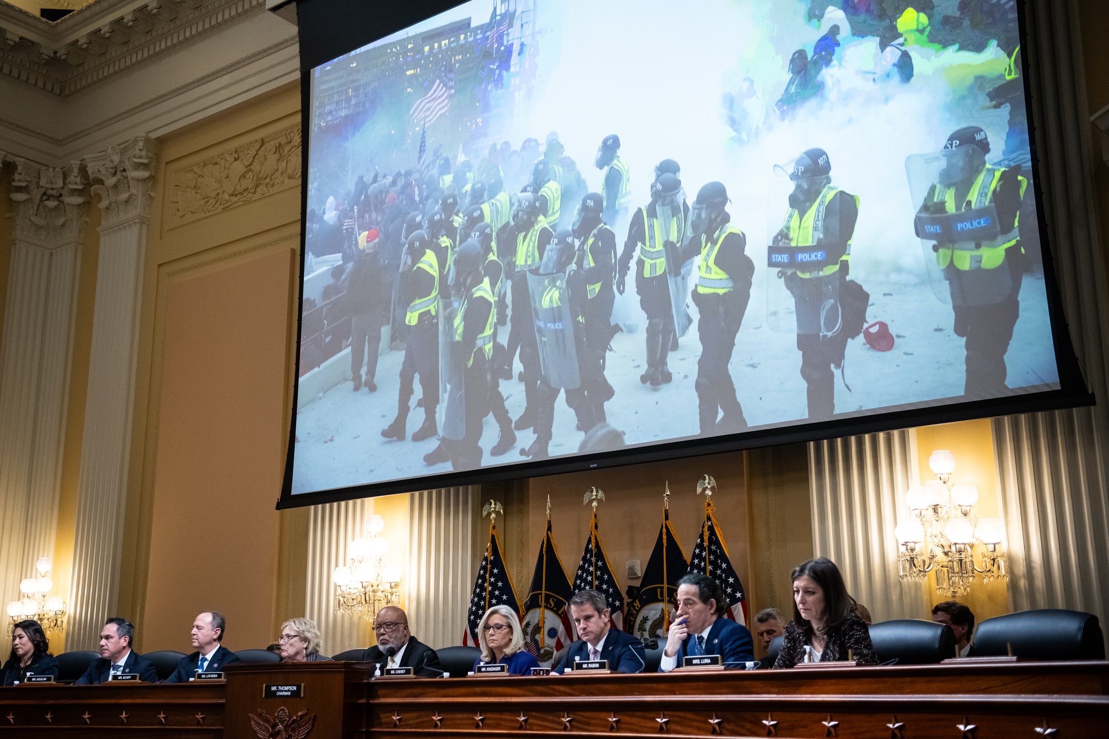  Members of the House Select Committee to Investigate the January 6th Attack on the Capitol watch a video presentation with images of the pro-Trump insurrection during a hearing, at the U.S. Capitol, on December 19, 2022. (Graeme Sloan for Sipa USA) 