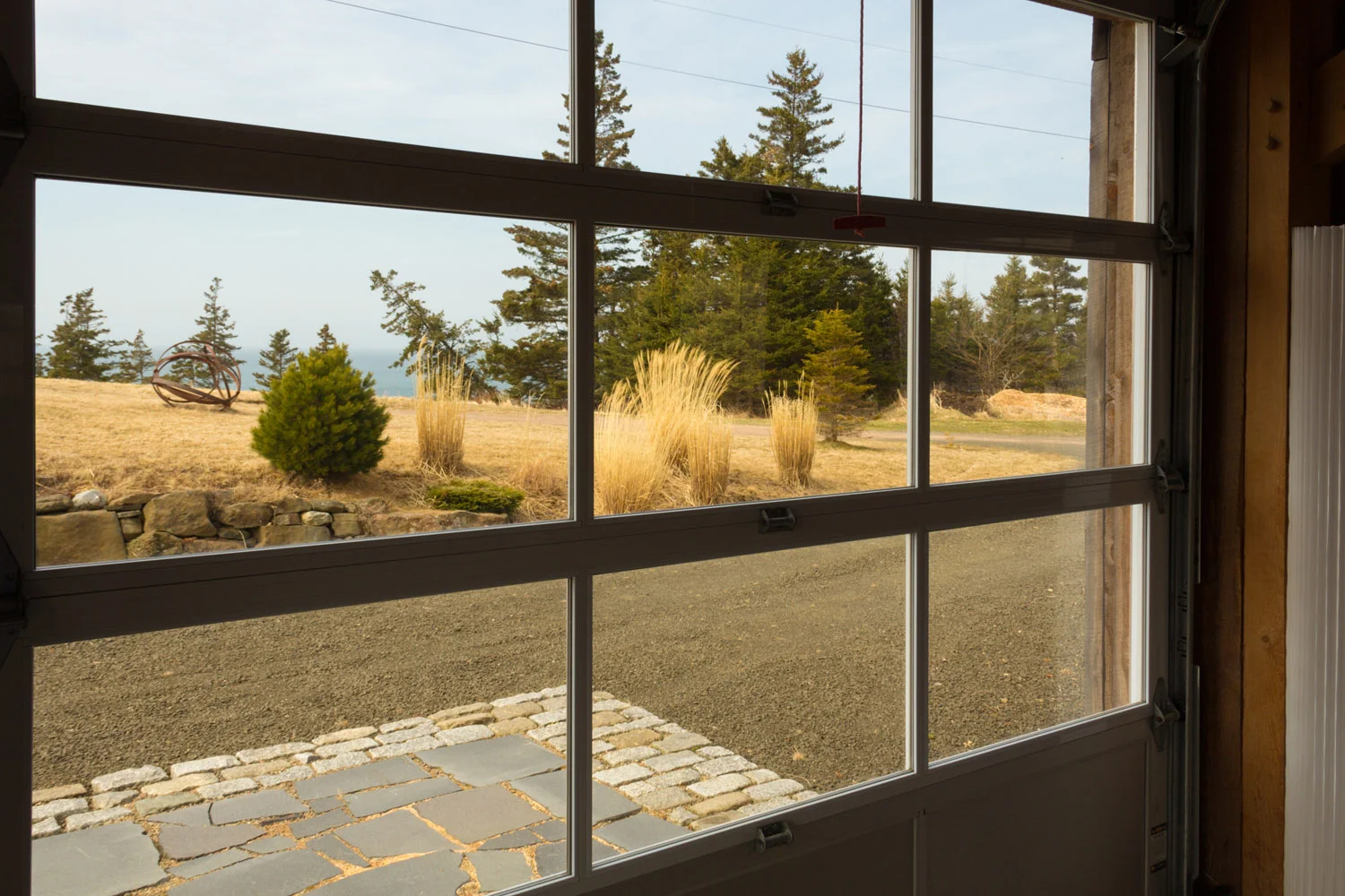 houdinidesign_ARCHITECTS_Ritchie-Gidney_Residence_Sandy-Cove_Digby_Acadian+Timber_Frame_Modern_Renovation_Interior_Garage_Door.jpg