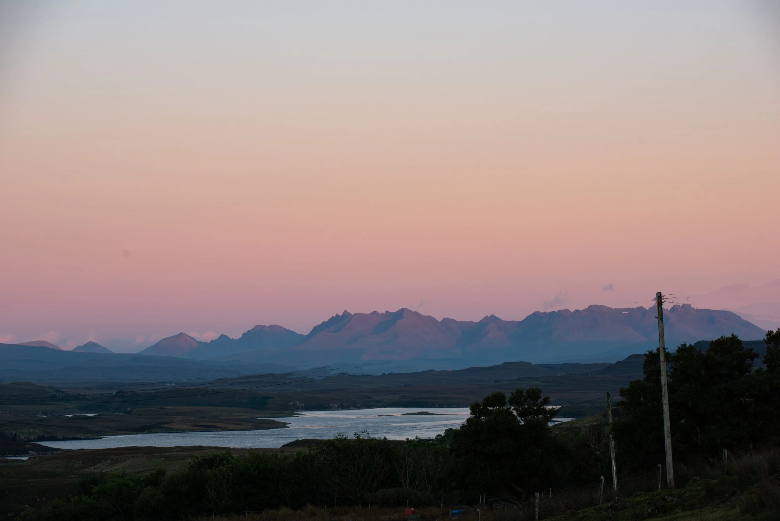 Evening Cuillin
 
 This is the west side of the Cuillin Mountains, taken in late evening from the crofting township of Husabost on the Duirinish peninsula on the Isle of Skye. This part of the Cuillin is usually called the "Black" Cuillin, because of