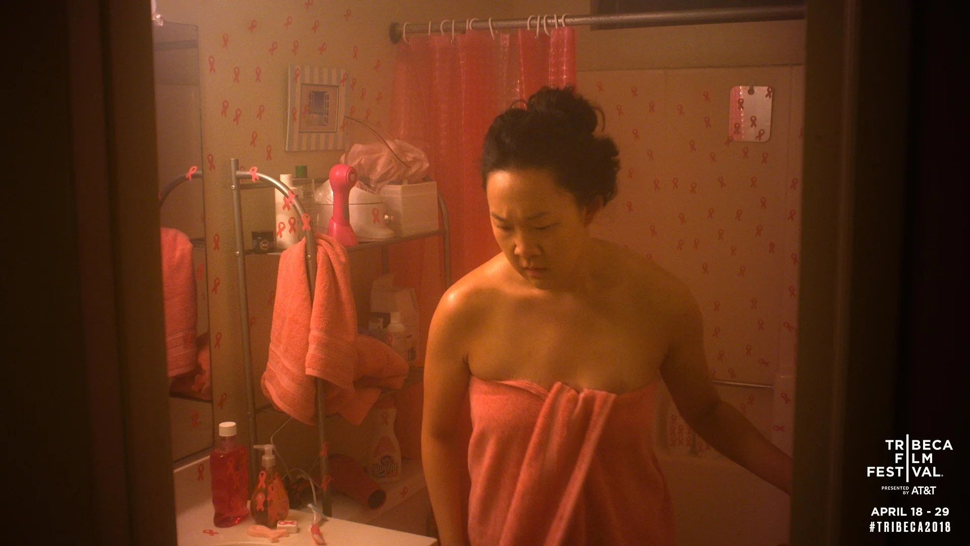 Teddy (Naomi Ko) is startled by her new decorated bathroom.