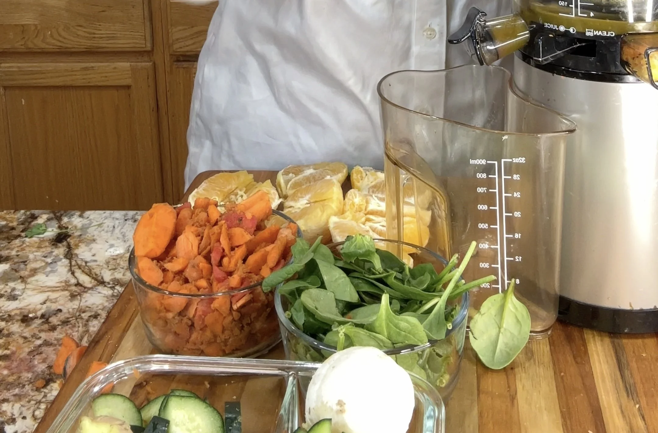 Golden Sunshine: Carrot and Orange fresh juice carrots, spinach, oranges, lime, and ginger with a slow press juicer