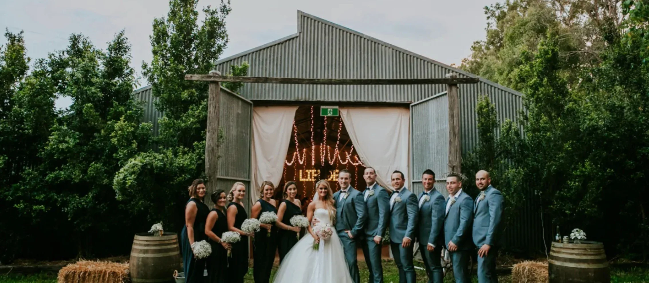 Brisbane Barn Weddings Bridal party outside the barn.jpg