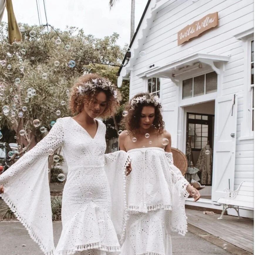 Two friends shopping with a personal stylist at Wilde Willow boutique