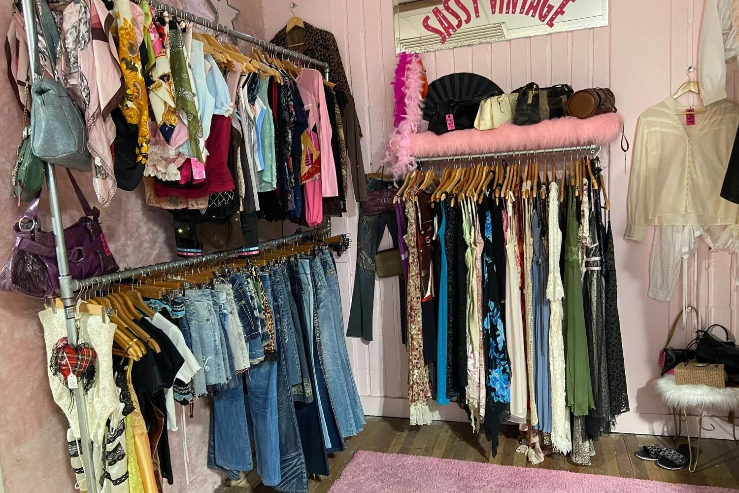 Racks of vintage and preloved clothing in a Brisbane store